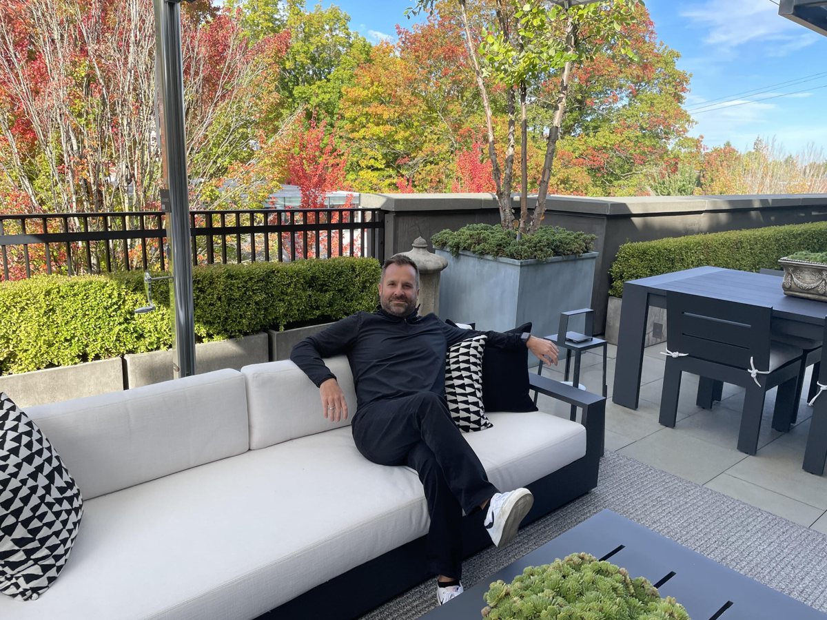 Jovo Ivekich relaxing on a terrace he designed